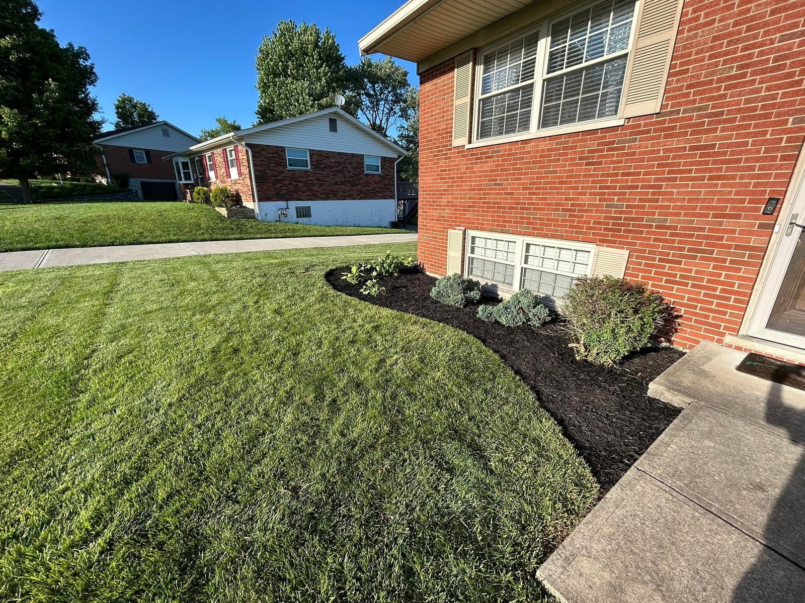 Flanagan Rural Lawn Care completed mowing and property cleanup near De Mossville, Kentucky