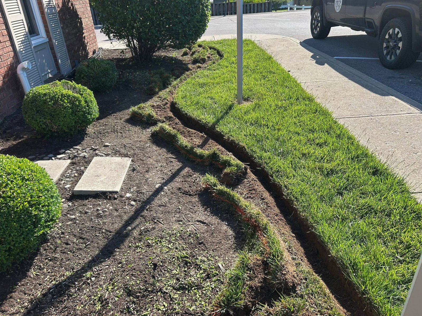 Commercial lawn care and grounds maintenance by Flanagan Rural Lawn Care