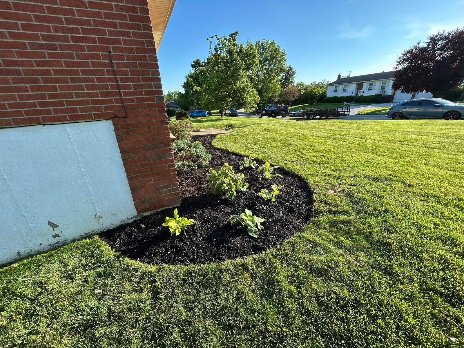 Yard cleanup, trimming, and mowing on a Kentucky property by Flanagan Rural Lawn Care